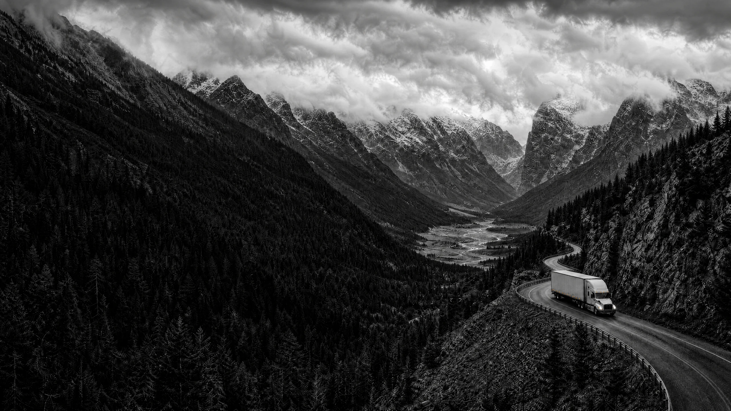 DSB truck on a scheduled route through a mountain valley